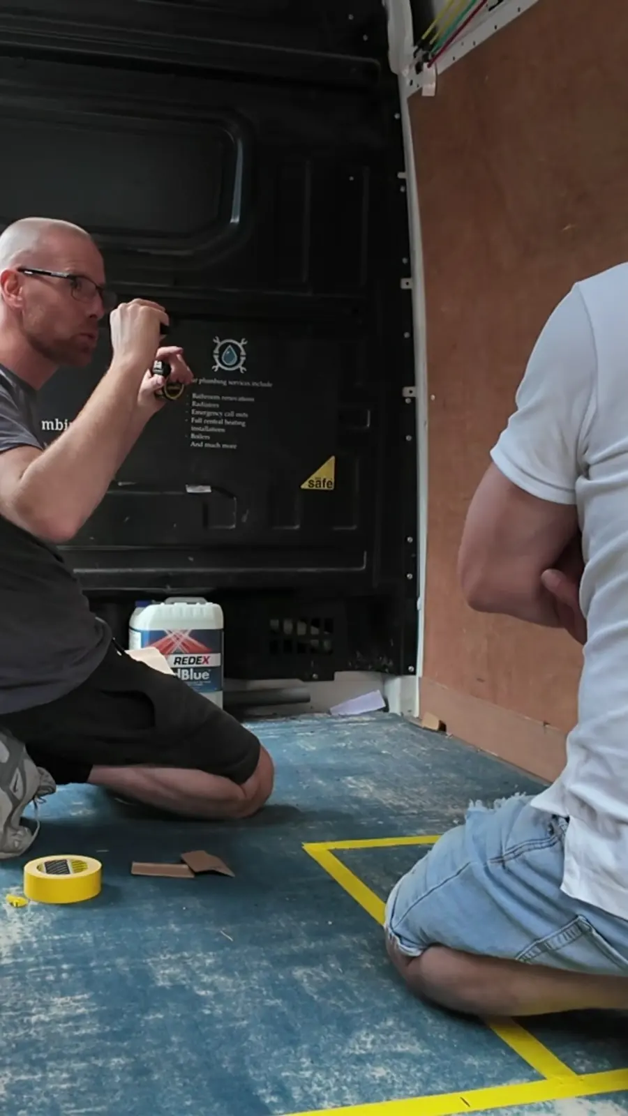 A measure up at the VANZ workshop: marking the furniture layout on the van floor with tape