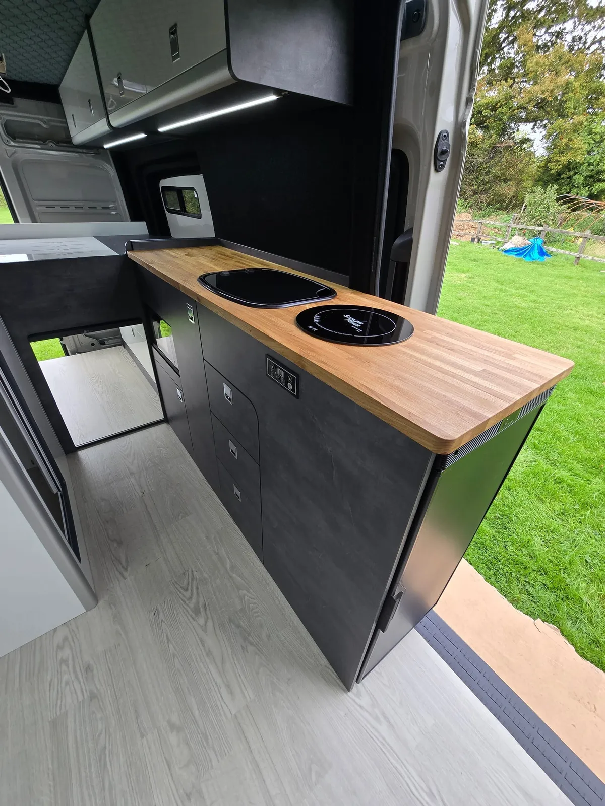 D6 kitchen pod with microwave space and an oak worktop